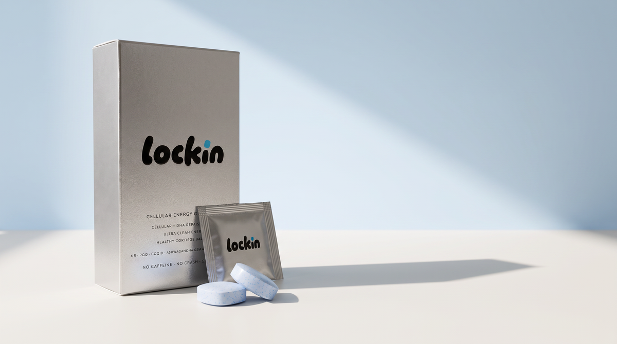 The lockin box and a foil sachet on a bone-white surface in soft daylight