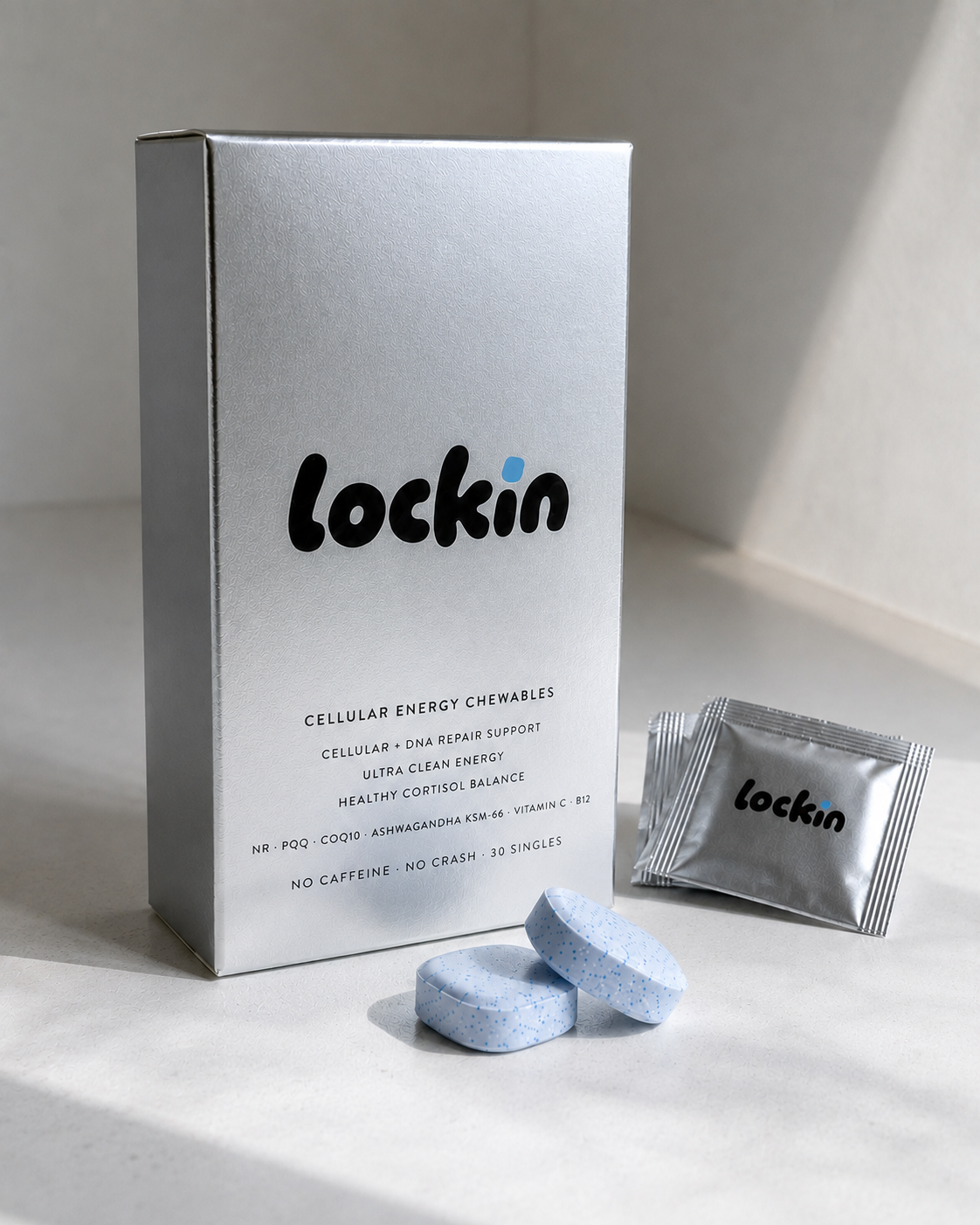 The box front with foil sachets and chewables in daylight