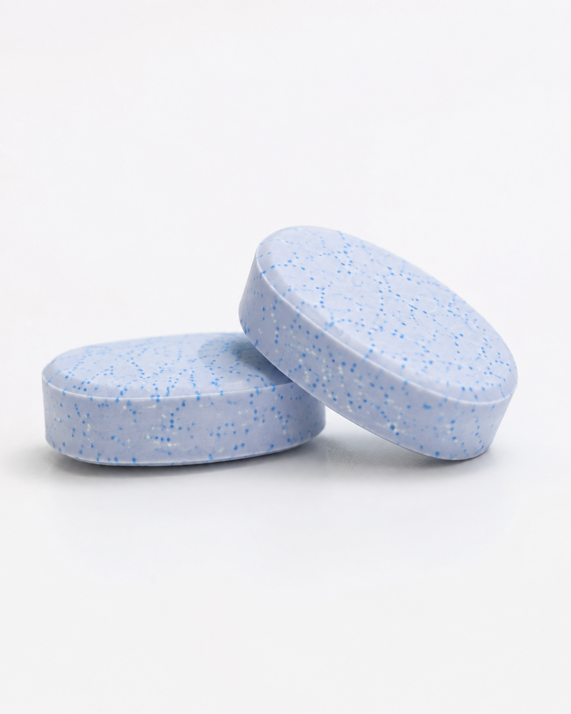 Close-up of the two speckled blue chewables